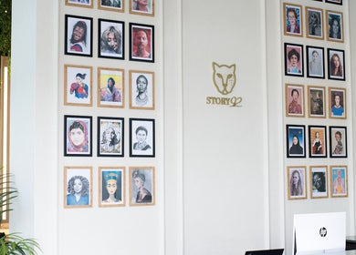 Artistic gallery wall at Story 92 House of Beauty, Dubai, Dubai, AE showcasing diverse iconic portraits.