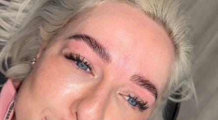Close-up of perfected eyebrows at ByRemmie_, Scarisbrick, England, GB. Showcases expert brow styling results.
