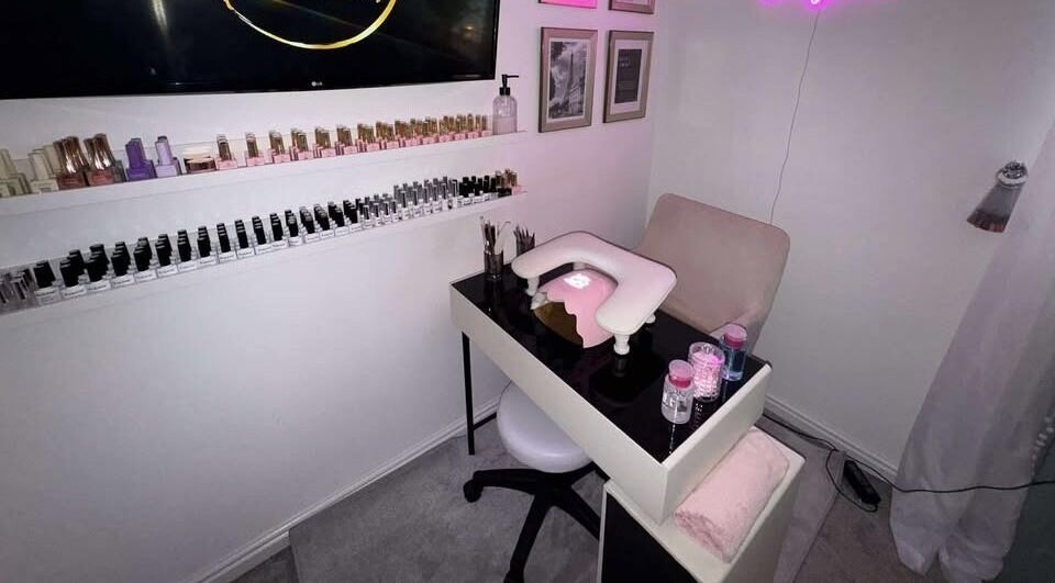 Elegant nail treatment setup at The Beauty Boutique, Plymouth, England, GB offering a variety of nail polishes.