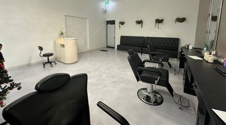 Spacious interior of iBrow & Lashes Studio, Queanbeyan, New South Wales, AU with styling chairs and minimalist decor.