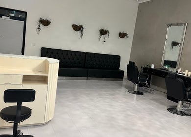 Elegant interior of iBrow & Lashes Studio in Queanbeyan, New South Wales, AU with chic seating and styling chairs.