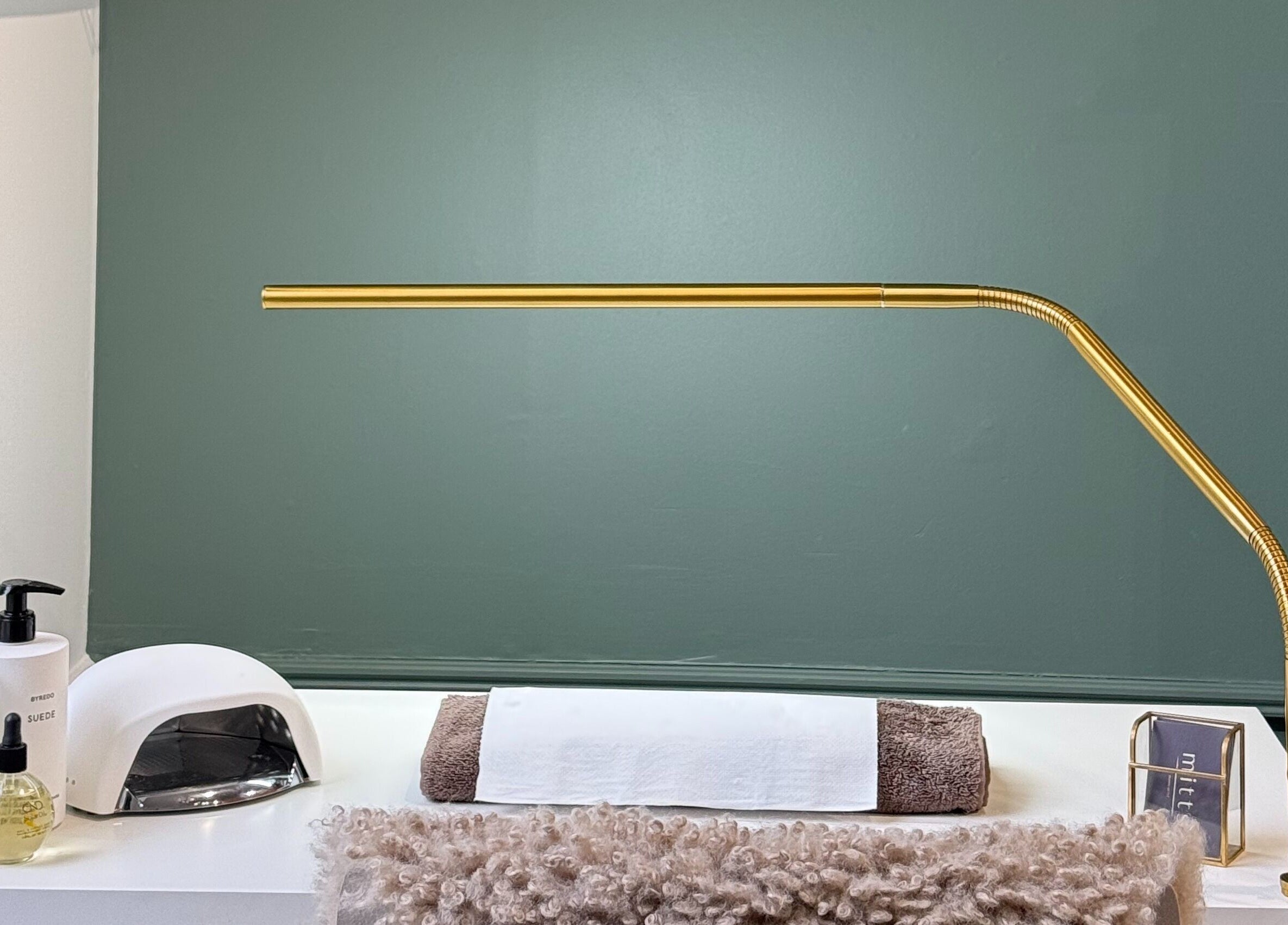 Elegant nail station setup at Mitts Nails in Edinburgh, Scotland, GB with stylish lighting.