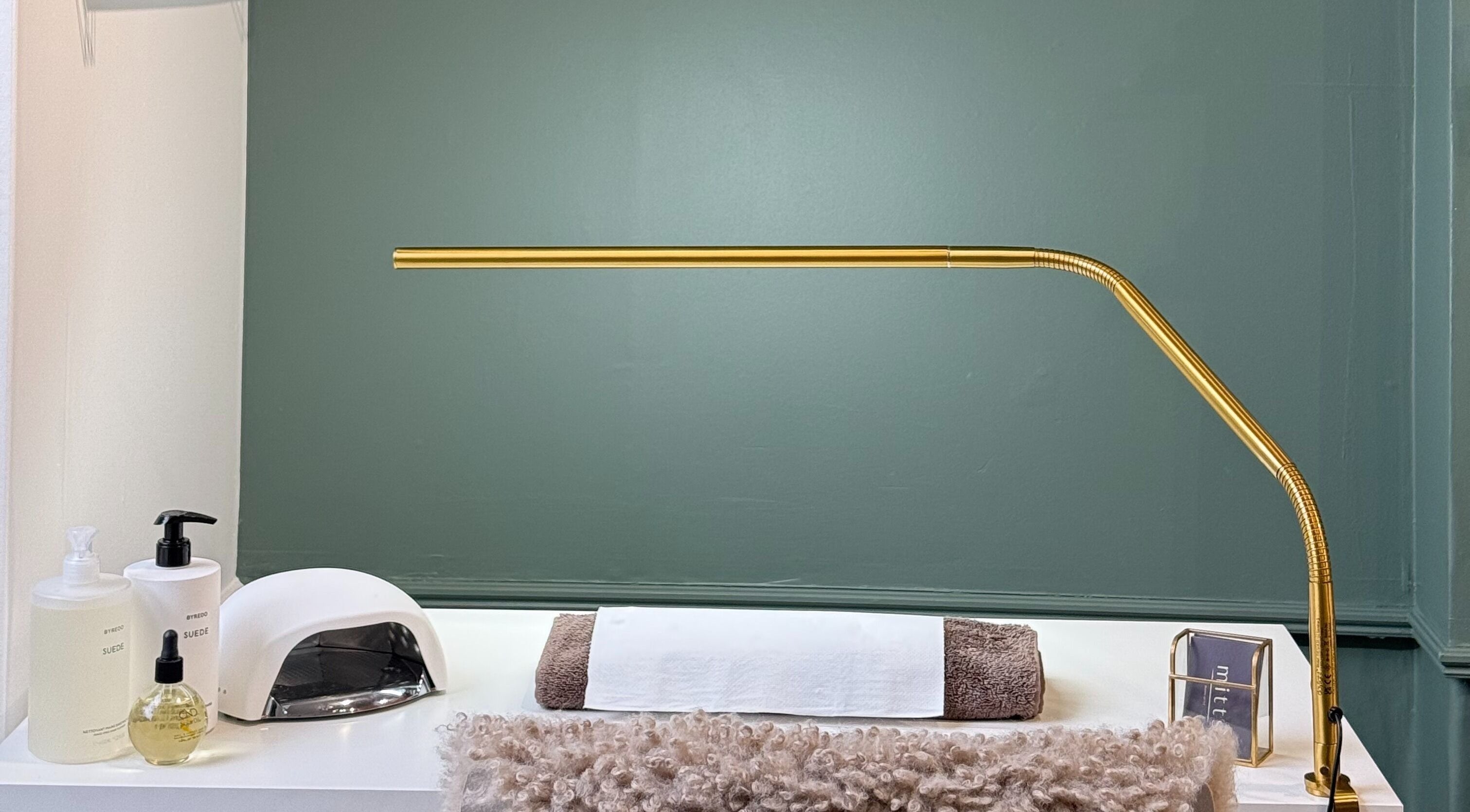 Elegant nail station setup at Mitts Nails in Edinburgh, Scotland, GB with stylish lighting.