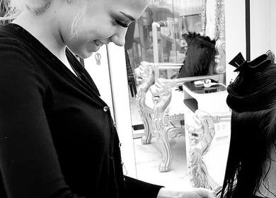 Stylist at Abi Forrester Hair - Mobile creating sleek hairstyle in London, England, GB.