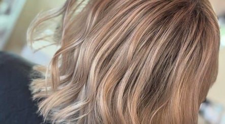 Elegant blonde waves styled by Abi Forrester Hair - Mobile in London, England, GB.