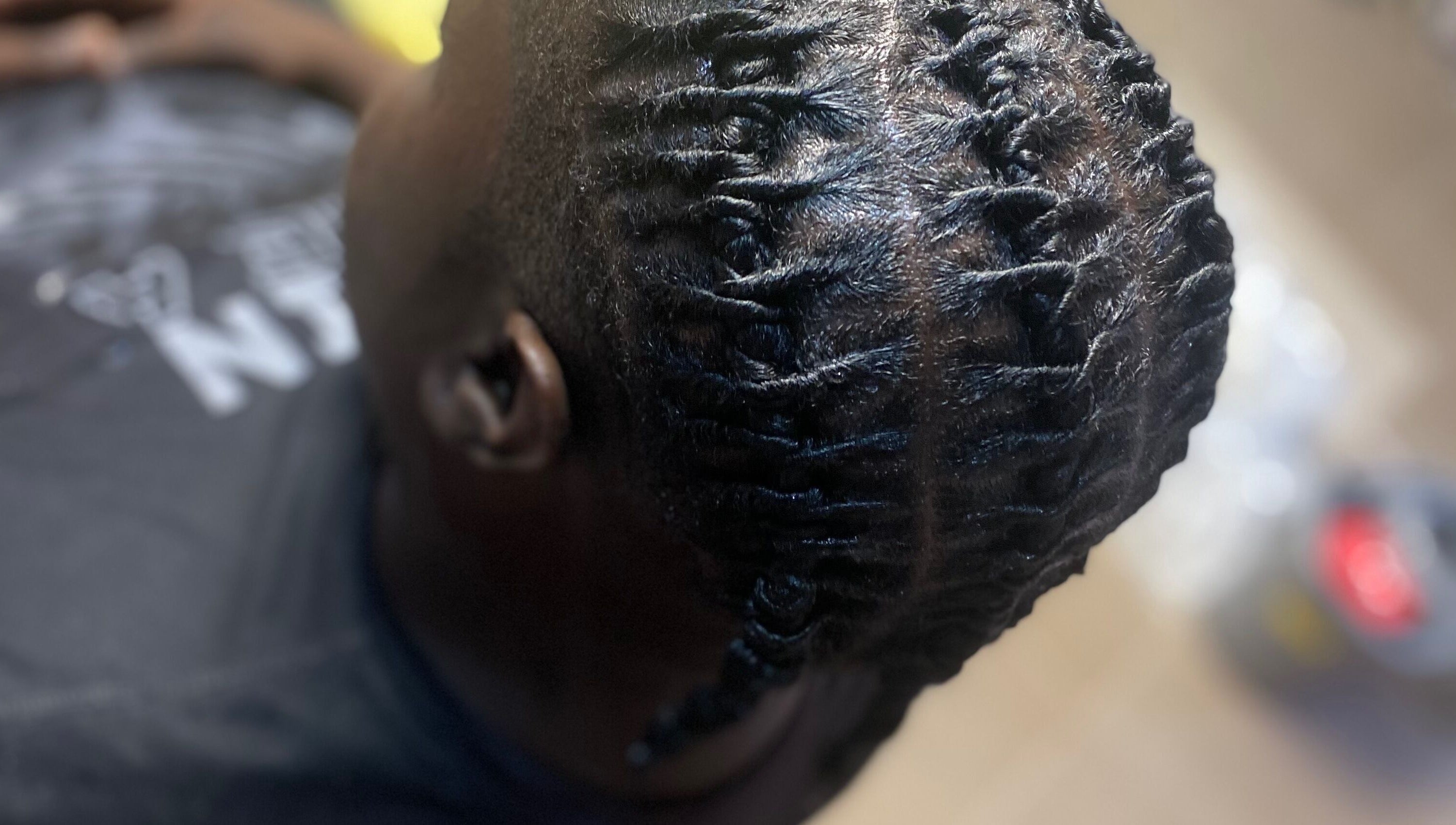 Intricate braided hairstyle at Baby Winx.ent, Eastlynne, Saint George, BB.