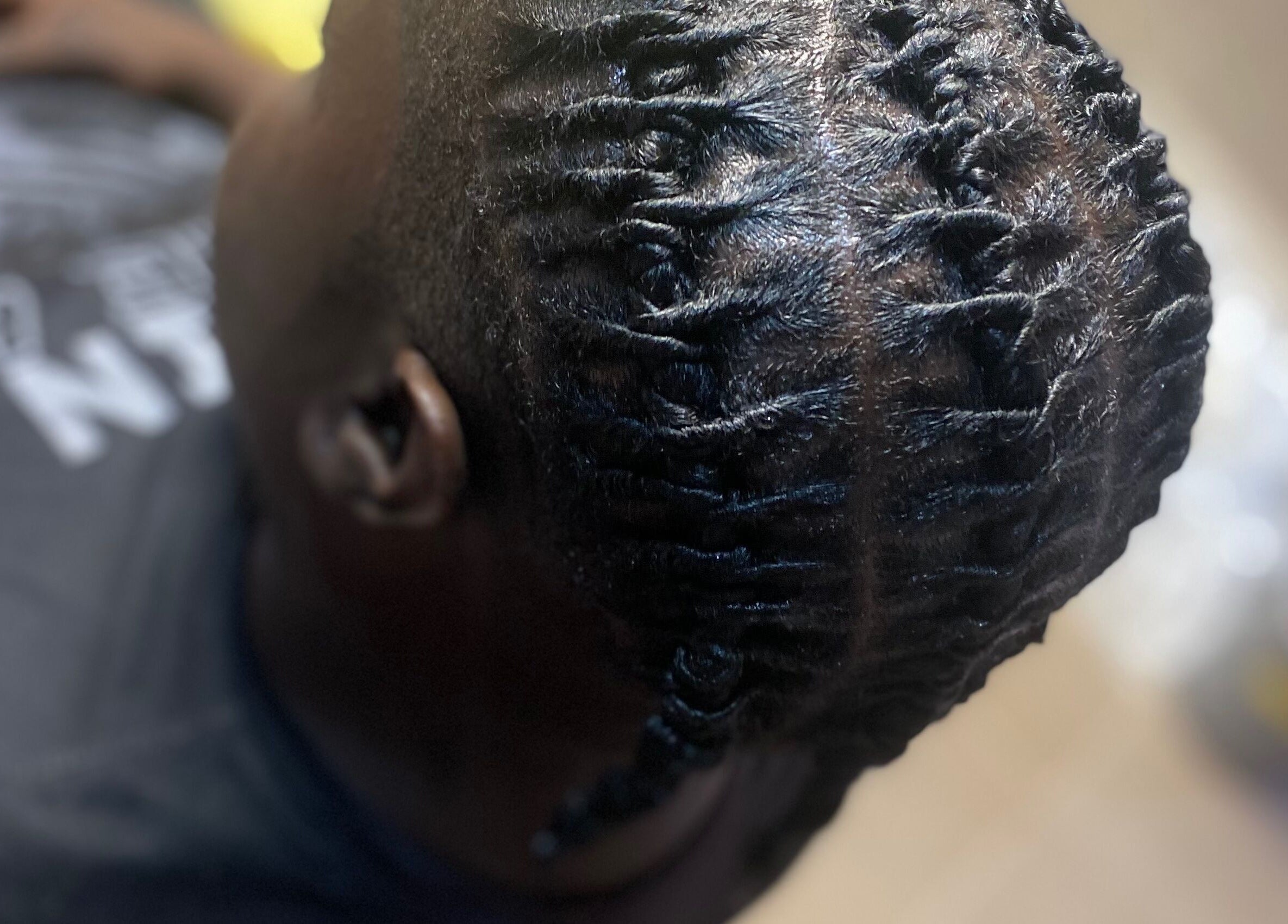 Intricate braided hairstyle at Baby Winx.ent, Eastlynne, Saint George, BB.