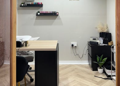 Cozy nail salon area at The Beauty Shed, Shaw, England, GB with modern decor and manicure setup.