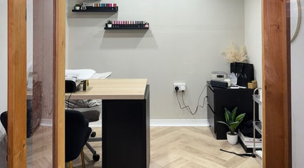 Cozy nail salon area at The Beauty Shed, Shaw, England, GB with modern decor and manicure setup.