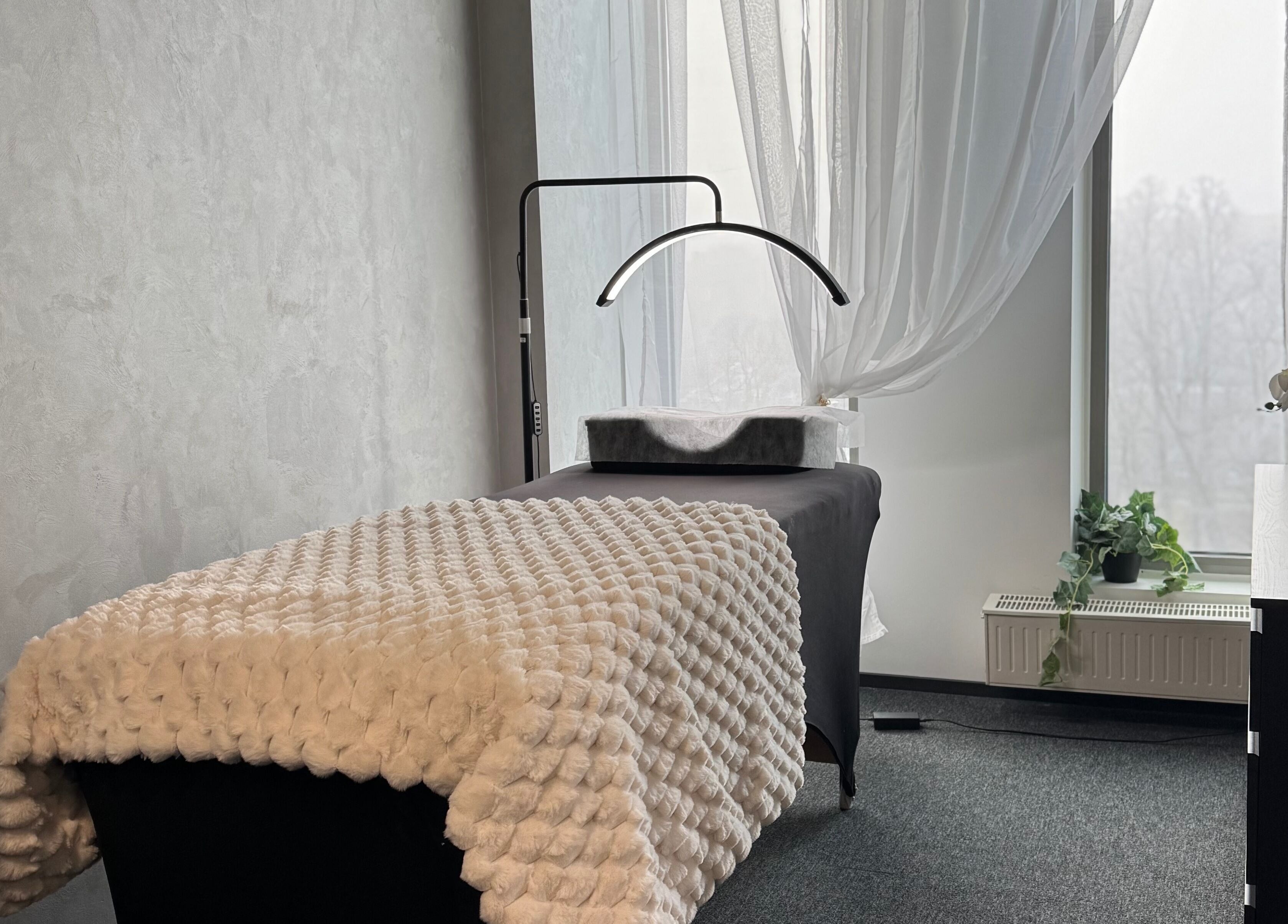Cozy treatment room at Lashhaus Tallinn with plush bedding, located in Tallinn, Harju maakond, EE.
