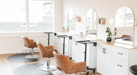 Elegant styling chairs at Rosie Atkins Hair, Winston-Salem, North Carolina, US, offering luxurious hair services.