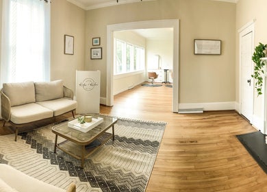 Elegant waiting area at Rosie Atkins Hair in Winston-Salem, North Carolina, US with natural light.