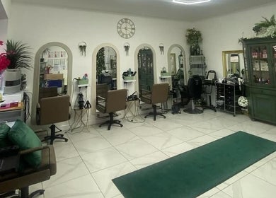 Interior of Tash @ studio210 in Nottingham, England, GB featuring elegant styling stations and decor.