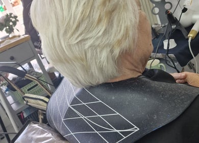 Haircut session at Stained Beauty Co in Arnold, England, GB, showcasing a chic short hairstyle.