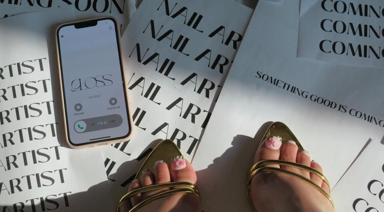 Gloss Sets by Cay in Gqeberha, Eastern Cape, ZA features elegant nail art and gold sandals.