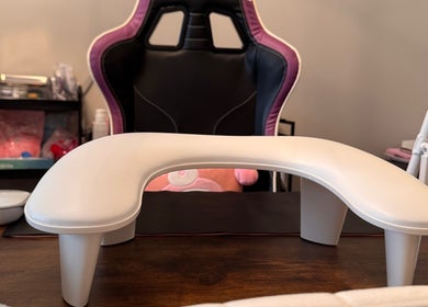 Elegant nail station at Nailsdonebyisabelle in Vaughan, Ontario, CA showcasing a modern workspace and chair.