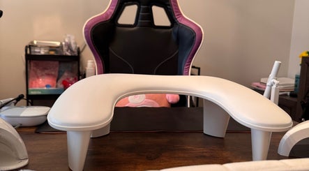 Elegant nail station at Nailsdonebyisabelle in Vaughan, Ontario, CA showcasing a modern workspace and chair.