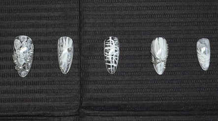 Monochrome nail art with intricate designs by Nailsdonebyisabelle in Vaughan, Ontario, CA.
