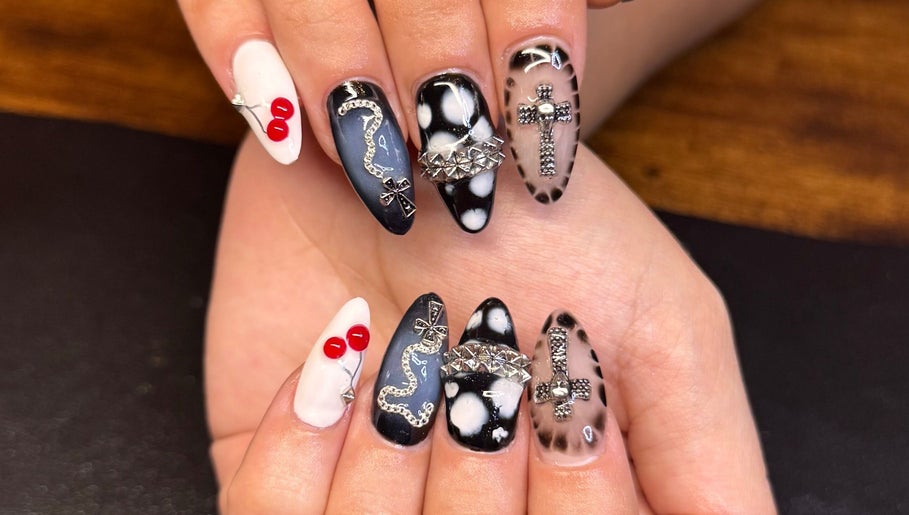 Intricate nail art design by Nailsdonebyisabelle in Vaughan, Ontario, CA featuring bold designs and embellishments.
