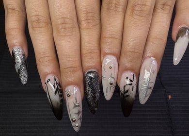 Intricate black and silver nail design at Nailsdonebyisabelle, Vaughan, Ontario, CA.