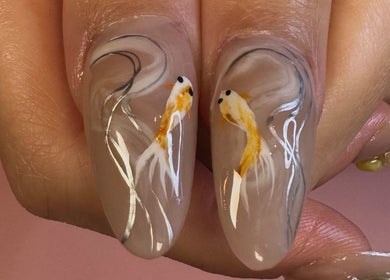Elegant fish nail art at Nailsdonebyisabelle, Vaughan, Ontario, CA, perfect for unique style seekers.