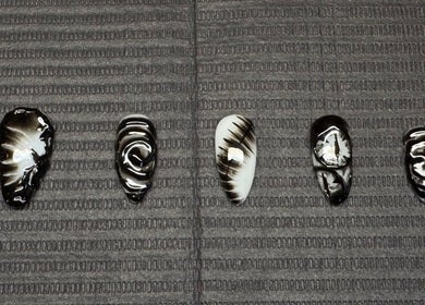 Unique monochrome nail art designs at Nailsdonebyisabelle, Vaughan, Ontario, CA on textured mat.