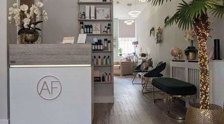 Elegant reception area of Kayleigh Louise Hair Stylist in Thornton, England, GB with decor and products on display.
