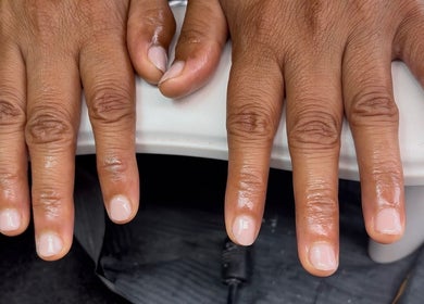 Freshly manicured nails at Ellavated Nailz in Cardiff, Wales, GB, showcasing sleek nail care.