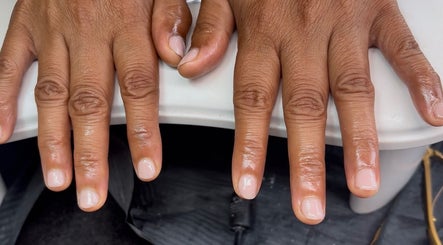 Freshly manicured nails at Ellavated Nailz in Cardiff, Wales, GB, showcasing sleek nail care.