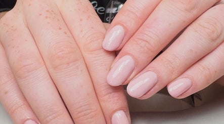 Elegant pink manicure at Ellavated Nailz in Cardiff, Wales, GB. Perfectly polished nails on display.