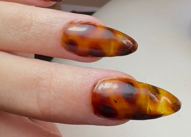 Stunning tortoiseshell nails crafted at Ellavated Nailz, Cardiff, Wales, GB. Perfect for a stylish look.
