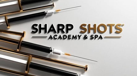Sharp Shots Academy & Spa logo with elegant syringes, San Antonio, Texas, US enhancing a sleek aesthetic.