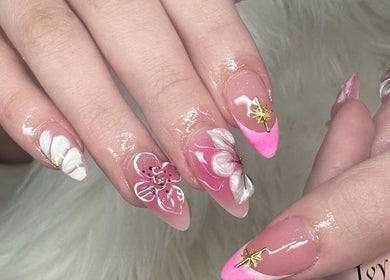 Exquisite floral nail art at Nailvana in Cincinnati, Ohio, US showcasing detailed design and glossy finish.
