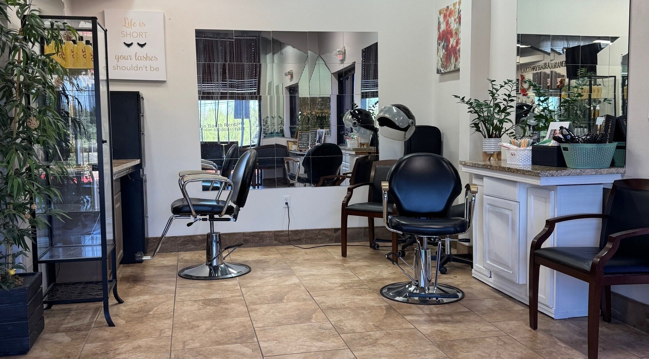 Sophisticated interior of Lavo Queen Lash & Beauty in Lakeway, Texas, US, showcasing elegant salon chairs and decor.
