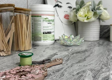 Elegant beauty tools at Aman’s Beauty Bar, Richmond, British Columbia, CA on a marble countertop.