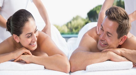 Couple enjoying a relaxing massage at Lido Massage in Gainesville, Georgia, US with a serene natural backdrop.