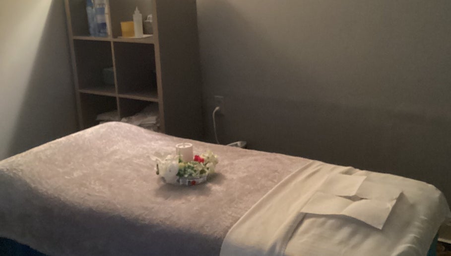 Relaxing massage room at Lido Massage in Gainesville, Georgia, US with cozy table setup.