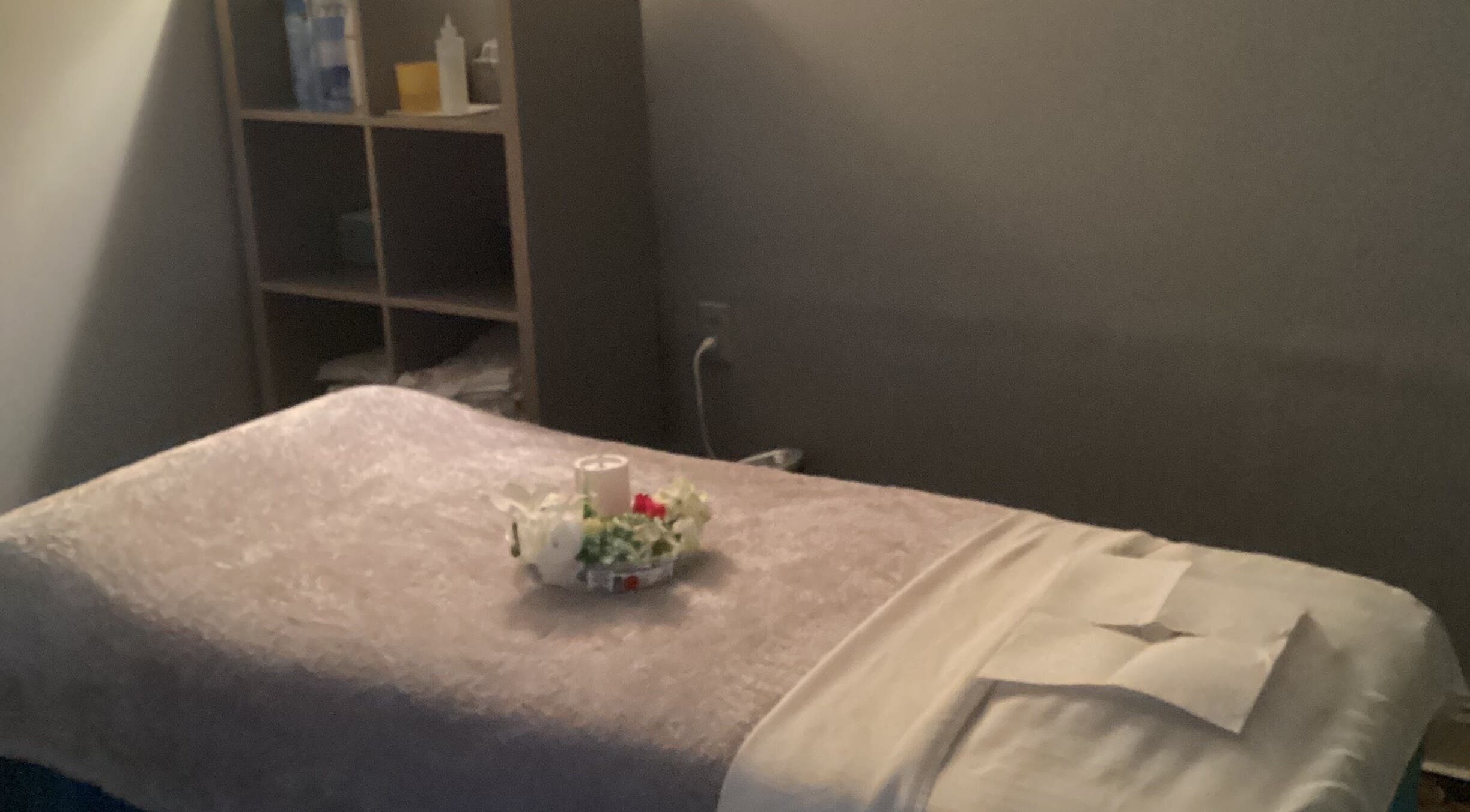 Relaxing massage room at Lido Massage in Gainesville, Georgia, US with cozy table setup.