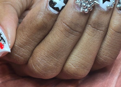 Intricate nail art with stars and gems by NailVixenKay The Travel Nail Tech, Chicago, Illinois, US.