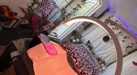 Relaxing beauty treatment room at Eyelashes Bristol, Bristol, England, GB, with floral decor and soft lighting.