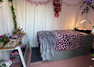 Cozy eyelash room at Eyelashes Bristol, adorned with florals and soft furnishings, Bristol, England, GB.