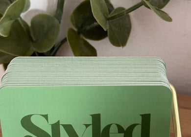 Green cards stack for Styled by Jenna at Blantyre, Scotland, GB, offering unique beauty and wellness services.