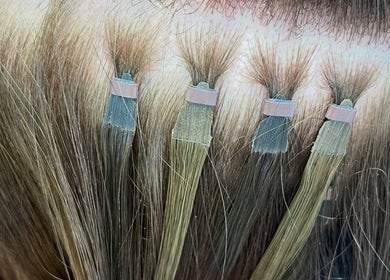 Hair extensions expertly applied at Styled by Jenna, Blantyre, Scotland, GB for a seamless look.