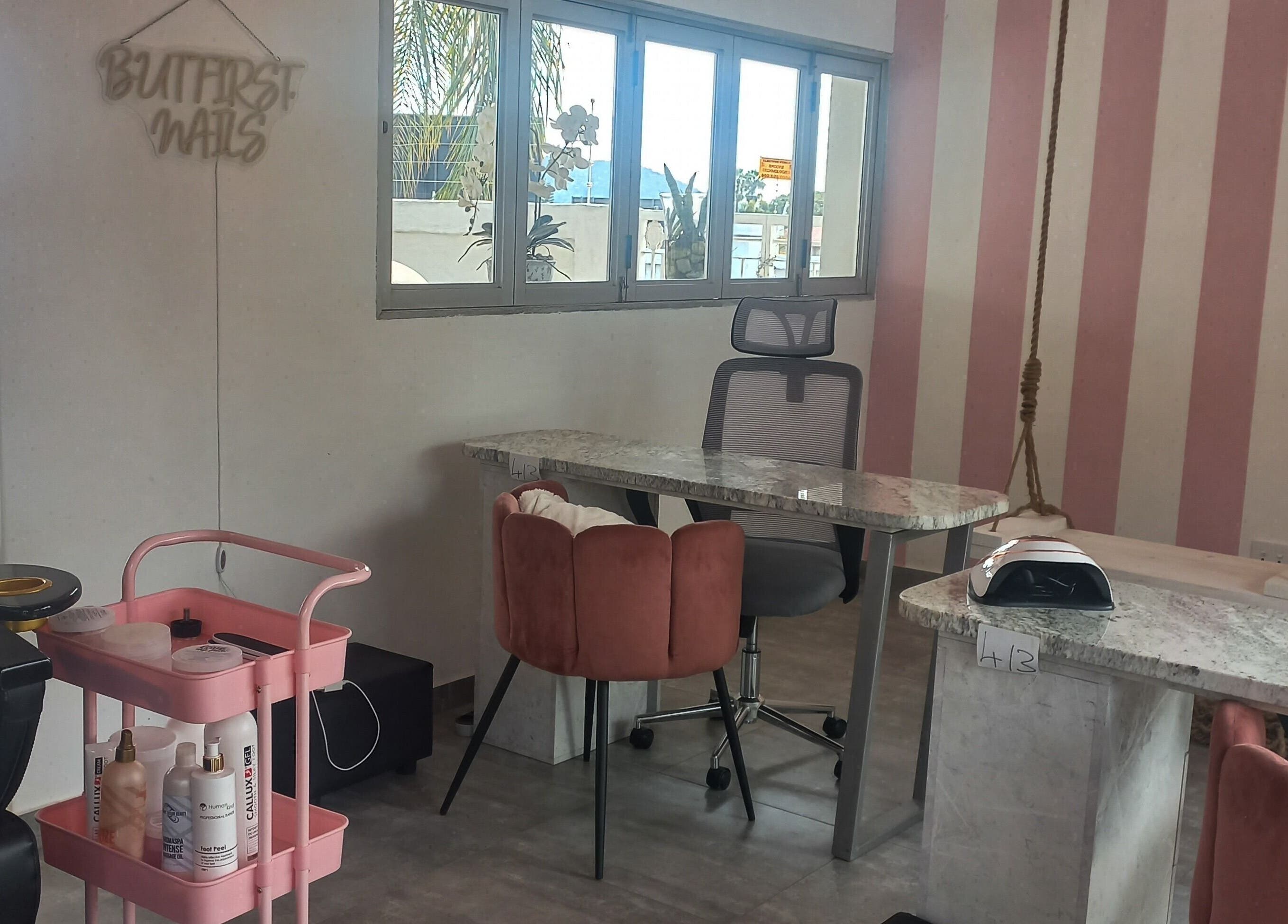 Elegant nail salon interior at Angelique's Aesthetics @ The New James, Pretoria, Gauteng, ZA with pink accents.