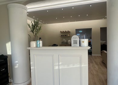 Reception area at By Annie Madeline, Normanton, England, GB, featuring modern decor and soft lighting.