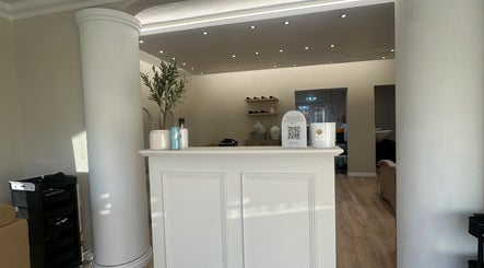 Reception area at By Annie Madeline, Normanton, England, GB, featuring modern decor and soft lighting.
