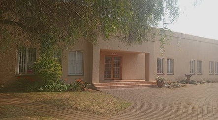 KG LovenNotes entrance with lush greenery in Benoni, Gauteng, ZA