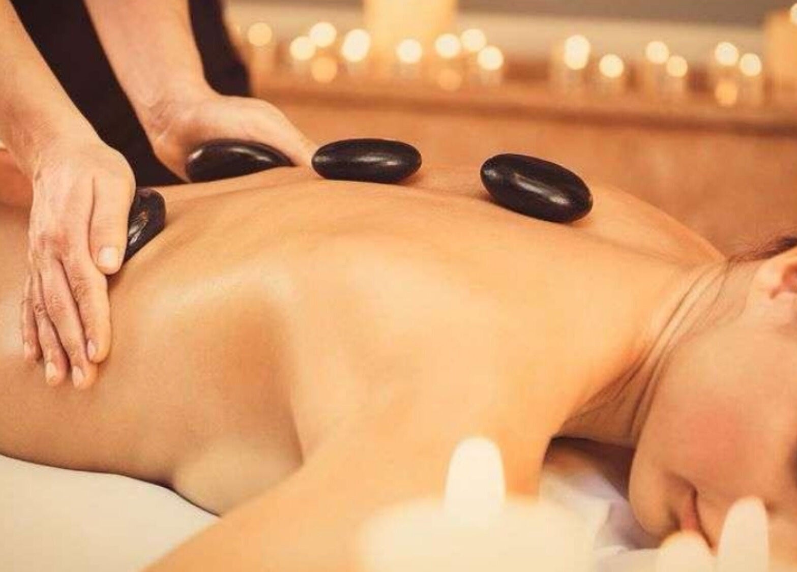 Hot stone massage at Sakura Flow, Narborough, England, GB offers ultimate relaxation and wellness.