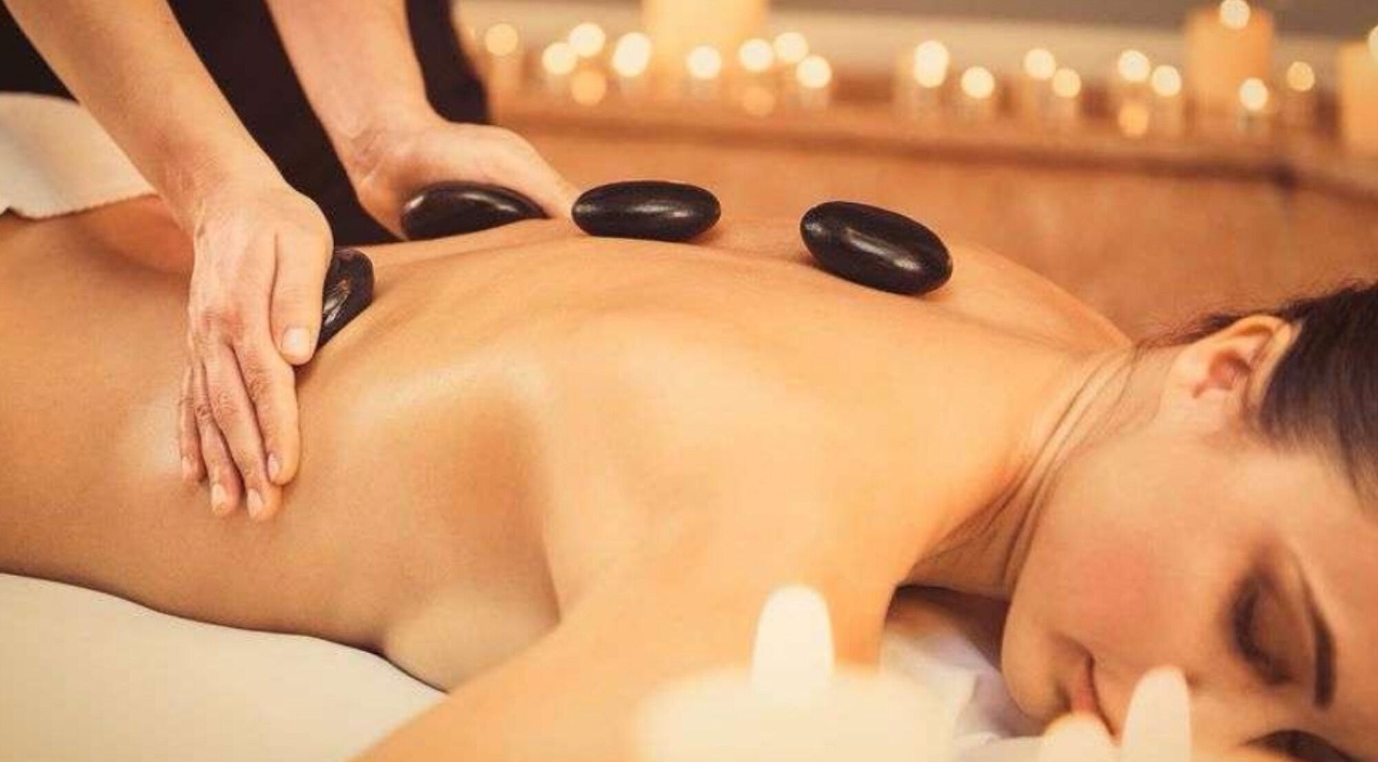 Hot stone massage at Sakura Flow, Narborough, England, GB offers ultimate relaxation and wellness.