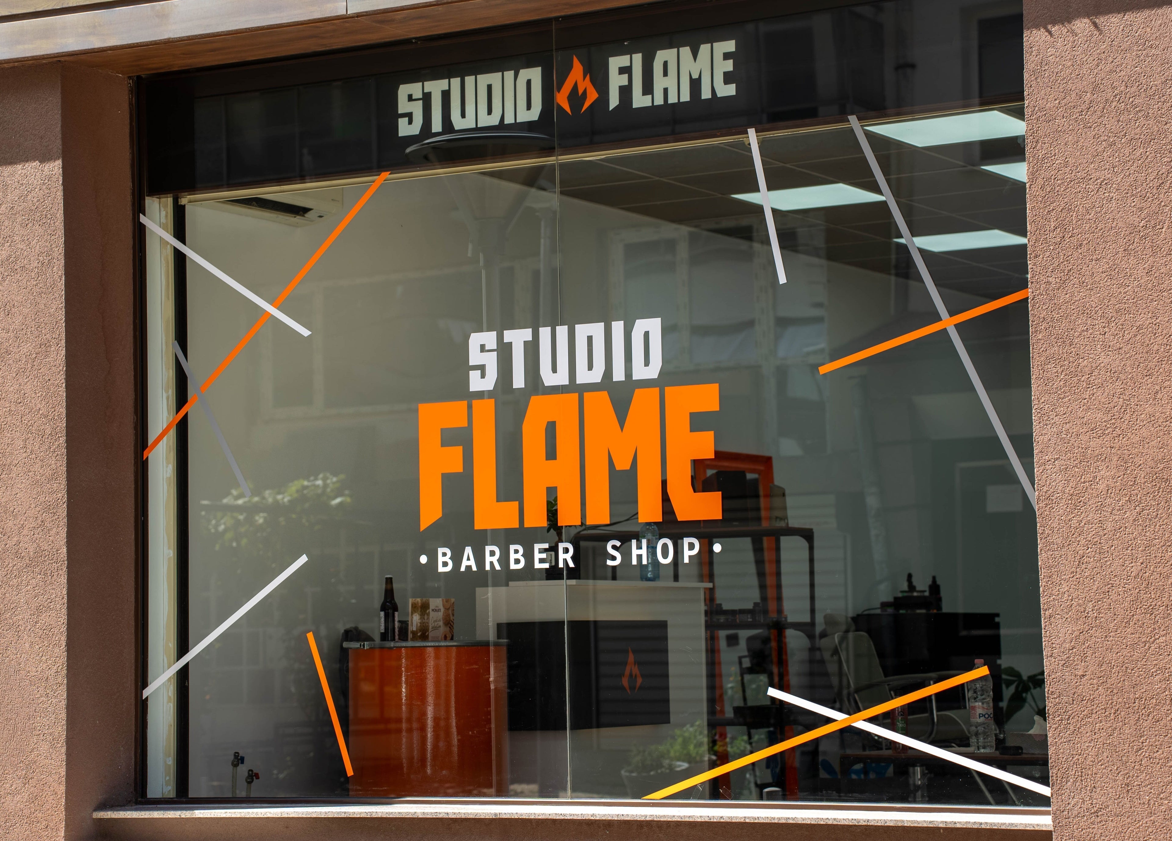 Фасада на Studio Flame в София, Софийска област, BG с модерен дизайн и ярко лого.